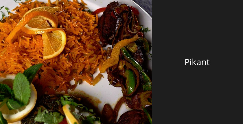 Kabobe Teeka Naregj Palau – Lamm vom Lavasteingrill mit Safranreis